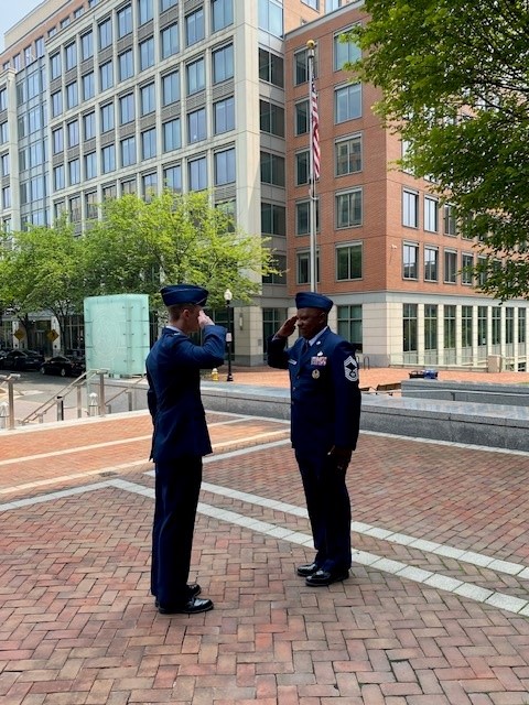 Lieutenant Jack Houser gave Chief Master Sergeant Twitty a U.S. silver dollar in exchange for his first salute upon Houser commissioning as a Second Lieutenant in the U.S. Air Force.   